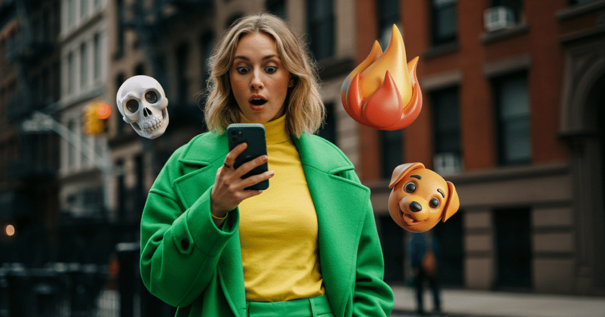 Image of a woman looking in surprise at her phone. Several 3D emojis float around her head: a skull, fire, and a dog.