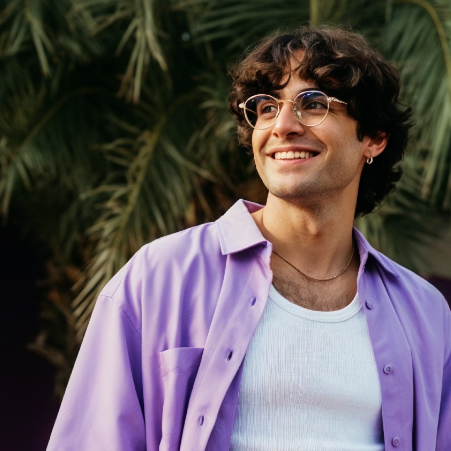 A man in a purple tshirt