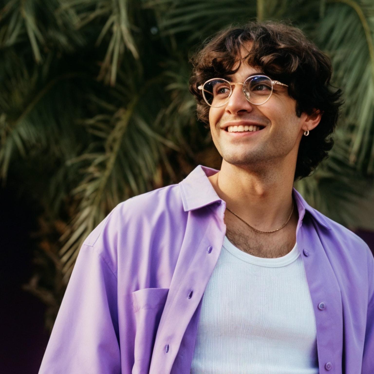 A man in a purple tshirt