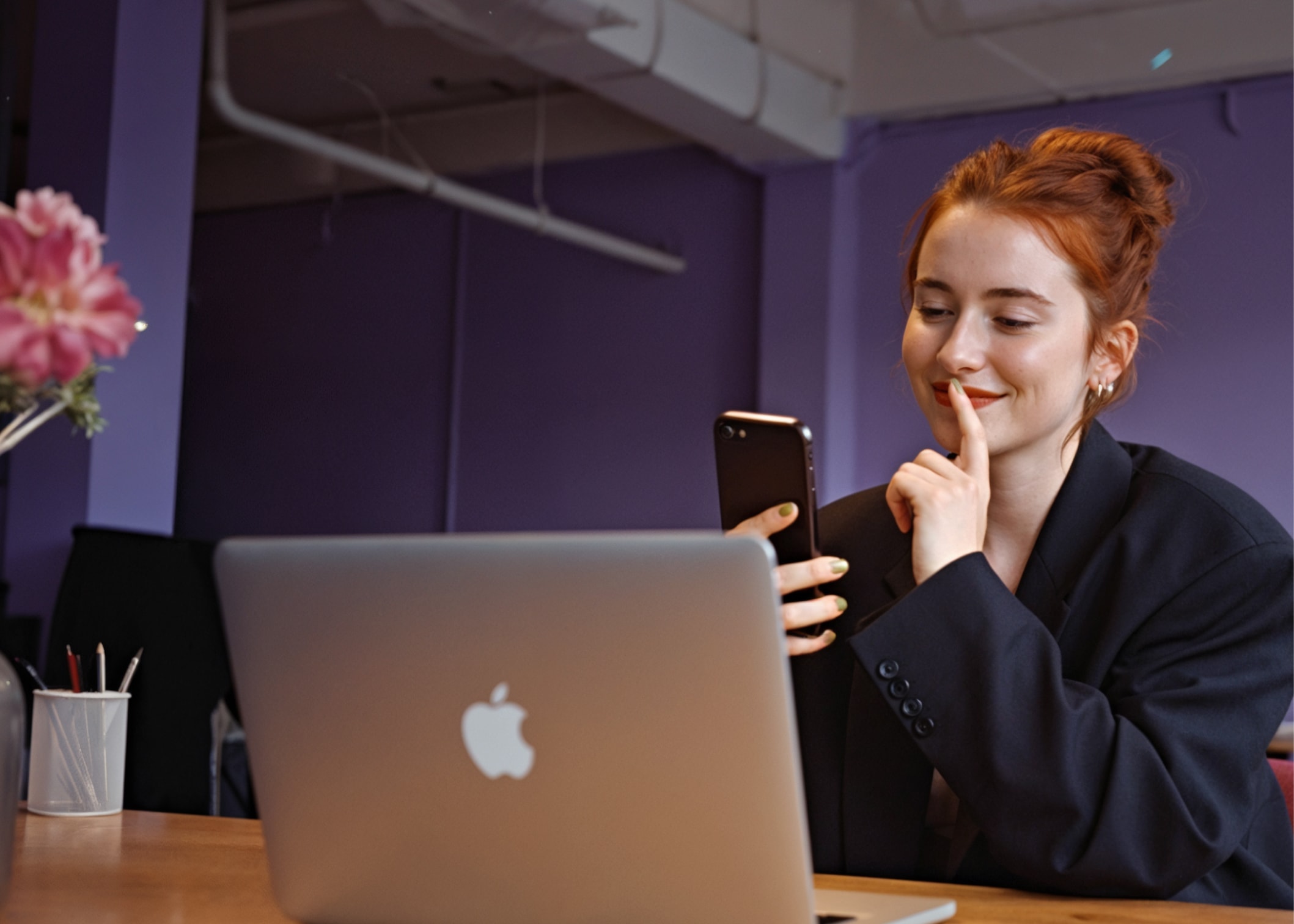 Woman with a phone in hand